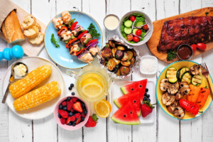 Summer picnic food featuring fruits and vegetables