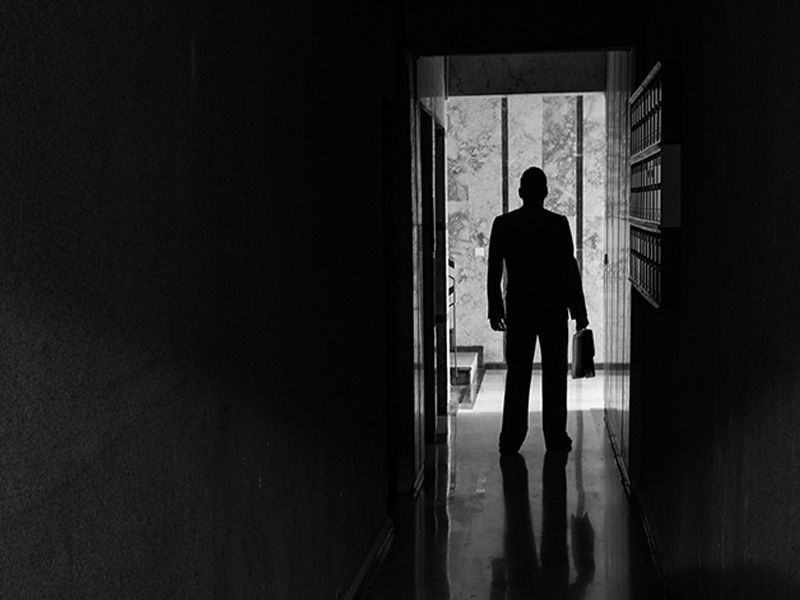 Recovery Starts When You Walk Out the Door: Why Community Is Your Lifeline 1 An image of a person walking out of darkness into a doorway filled with light