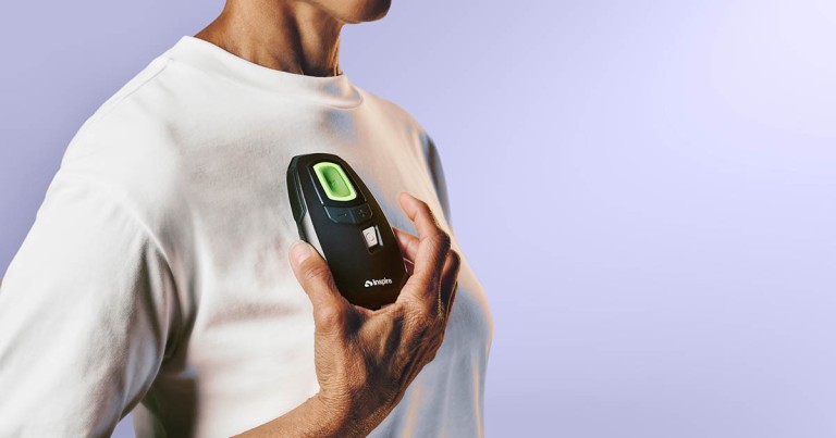 Person holding an Inspire remote