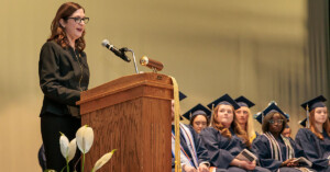 Val Waid speaks at the Sharon School of Nursing graduation